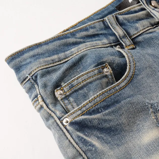 Distressed Slim-Fit Light-Wash Blue Jeans 11