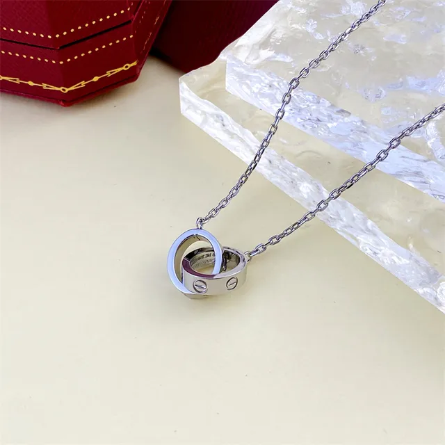 Gold and Silver Interlocking Ring Pendant Necklaces 2
