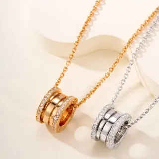Colliers à pendentif cylindrique multi-anneaux en ton or et argent Pavé