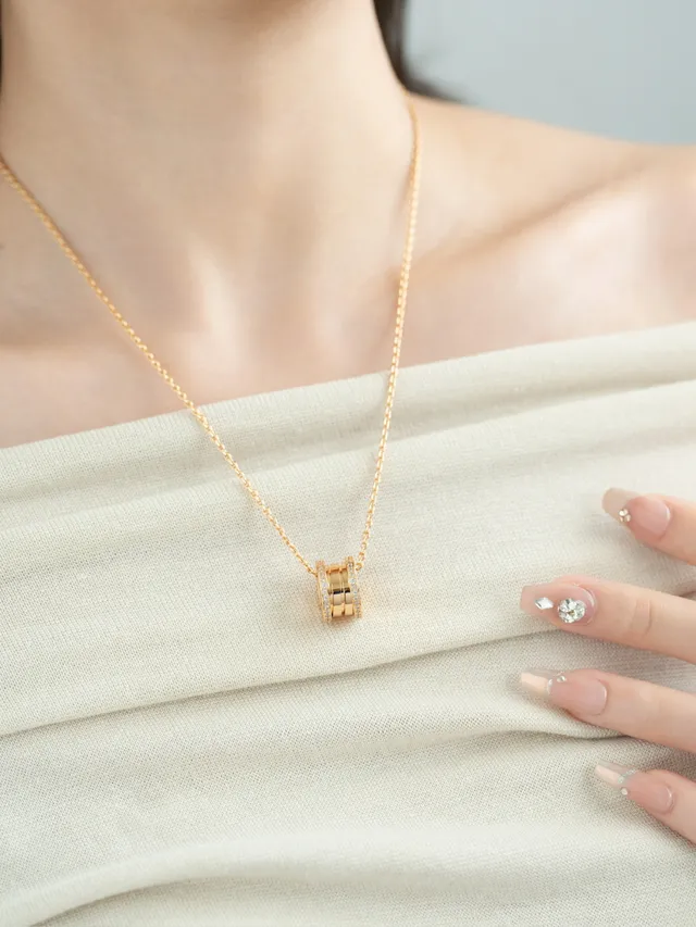 Gold and Silver Tone Pavé Multi-Ring Cylindrical Pendant Necklaces 2
