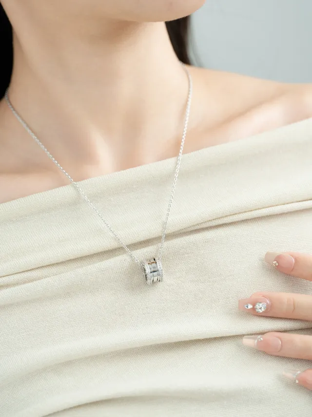 Gold and Silver Tone Pavé Multi-Ring Cylindrical Pendant Necklaces 5