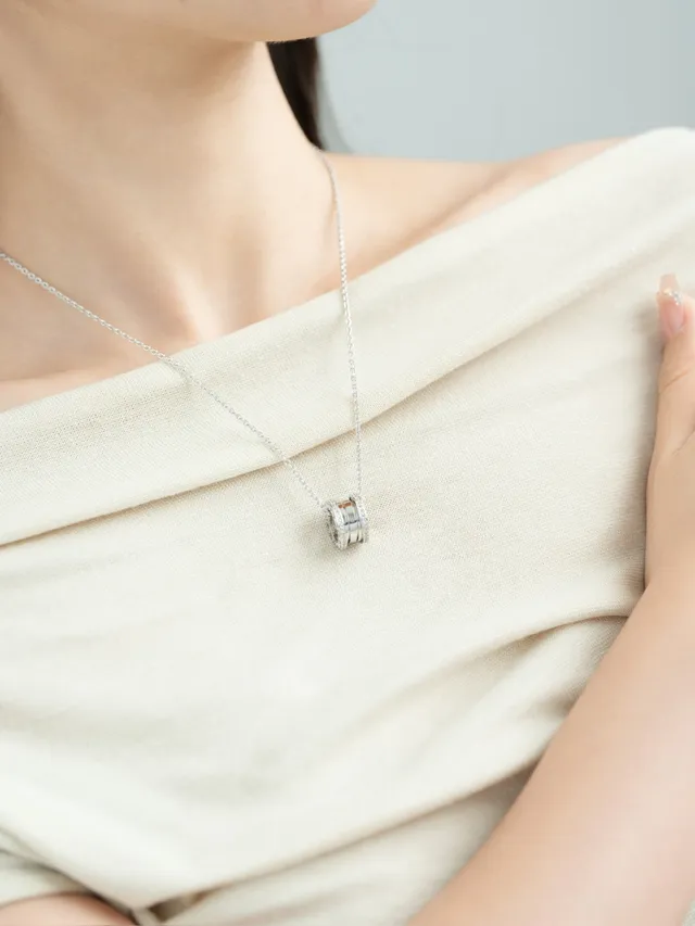 Gold and Silver Tone Pavé Multi-Ring Cylindrical Pendant Necklaces 7