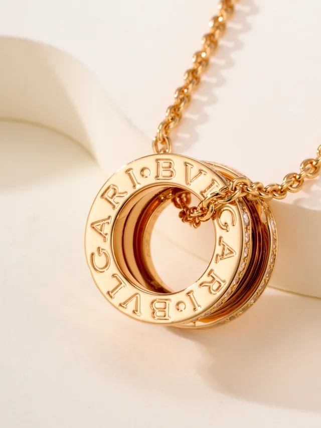 Gold and Silver Tone Pavé Multi-Ring Cylindrical Pendant Necklaces 12