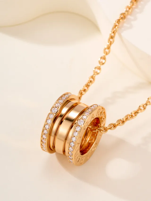Gold and Silver Tone Pavé Multi-Ring Cylindrical Pendant Necklaces 13