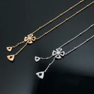 Collier pendentif floral or et argent avec gouttes triangulaires pendantes