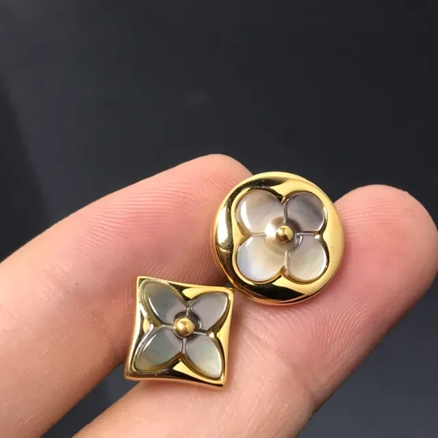 Broche de flor de ouro e prata em metal com incrustações 2