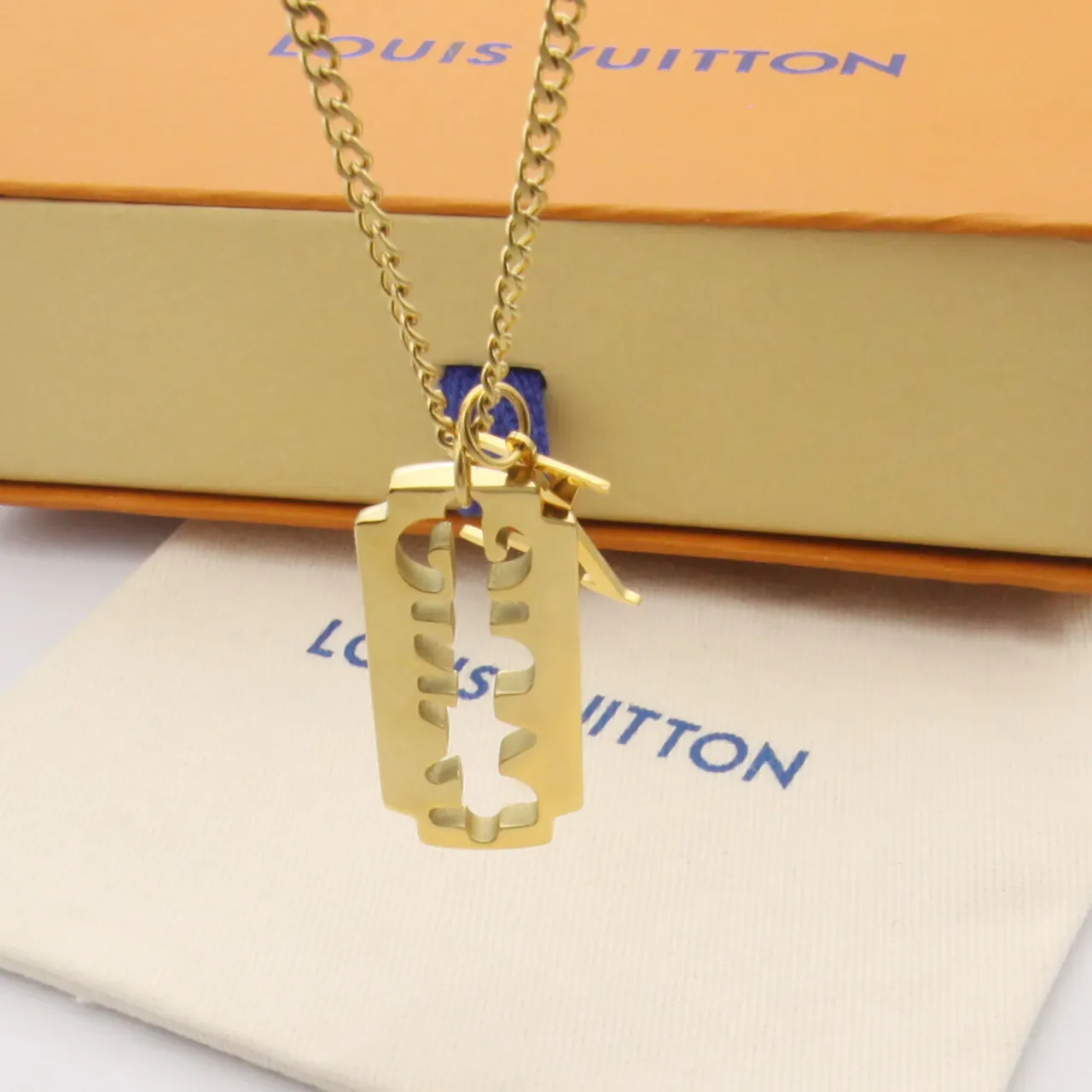 Gold Silver Razor-Blade-Shaped Pendant Cutout Monogram Motif Necklace 2