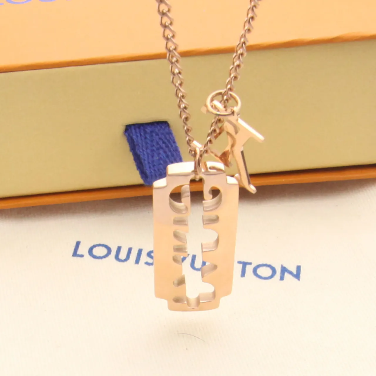 Gold Silver Razor-Blade-Shaped Pendant Cutout Monogram Motif Necklace 4