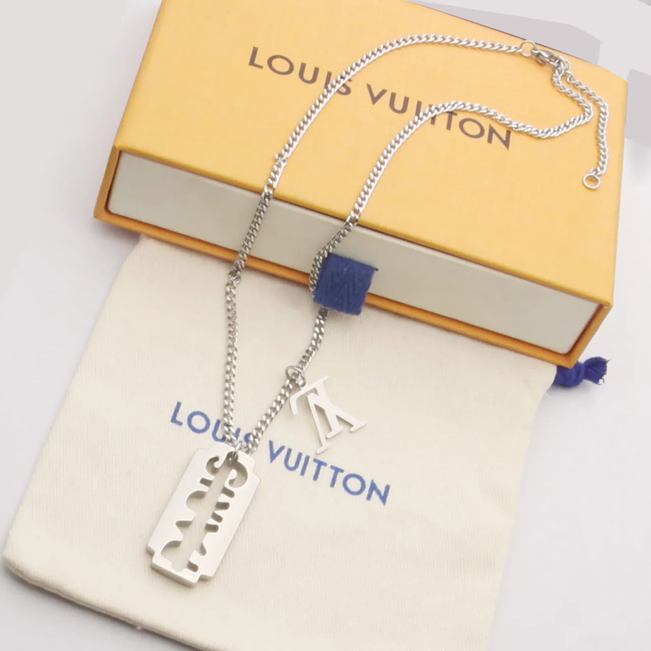 Gold Silver Razor-Blade-Shaped Pendant Cutout Monogram Motif Necklace 5