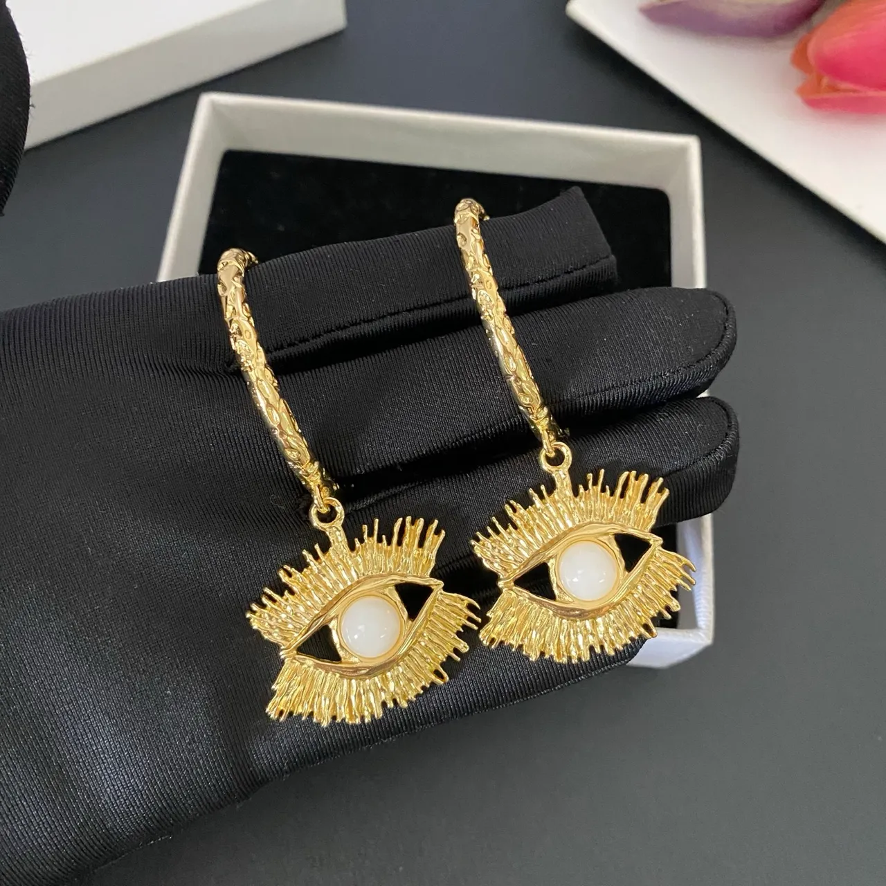 Gold White Textured Hoop Eye Motif Pendant Earrings 5