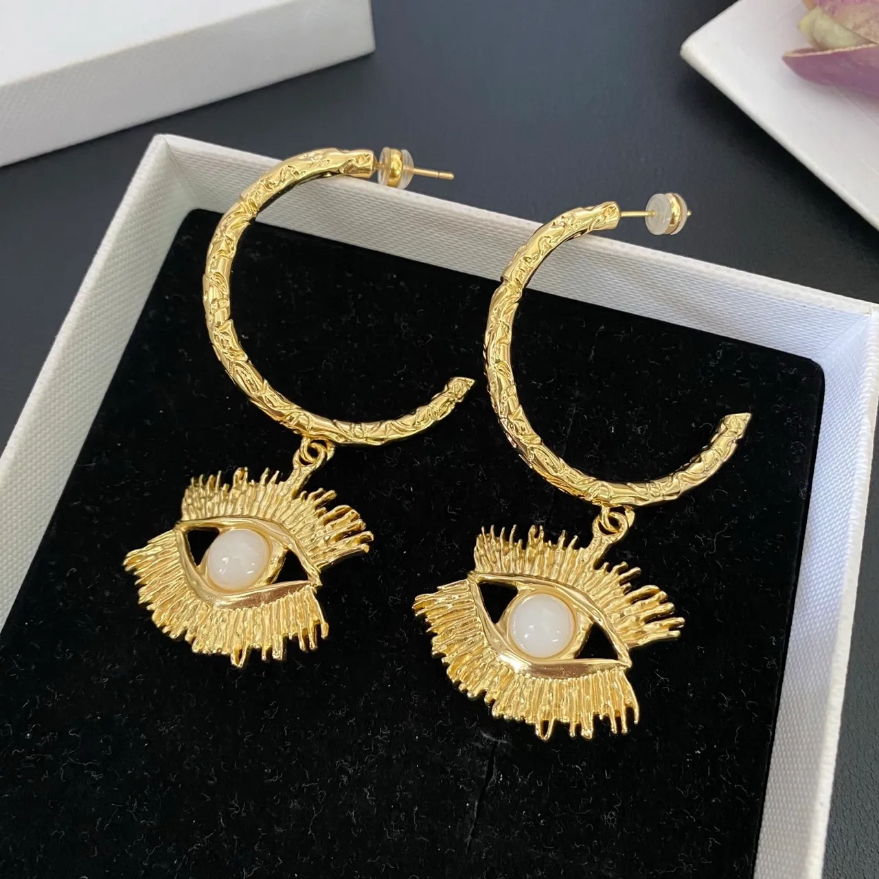 Gold White Textured Hoop Eye Motif Pendant Earrings 6