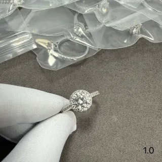 Halo Setting Round Brilliant Center Stone Ring