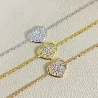 Colar com forma de coração em prata e ouro pavé