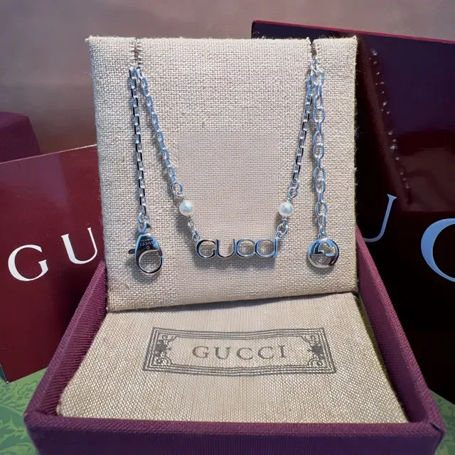 Gucci Alphabet Collection Gold White Chain Interlocking G Charm Bracelet 6