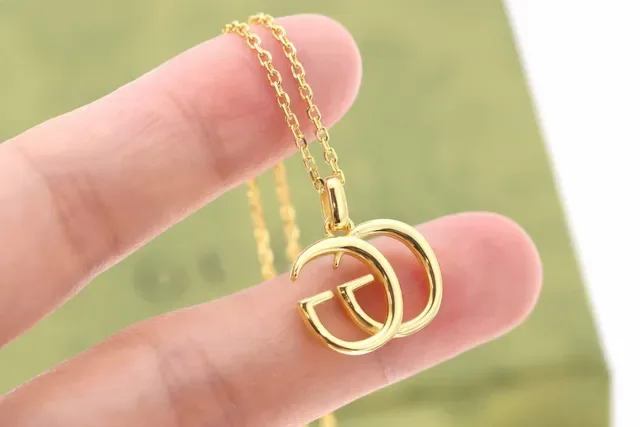 Gucci Double G Gold-Tone Interlocking Pendant Necklace 8