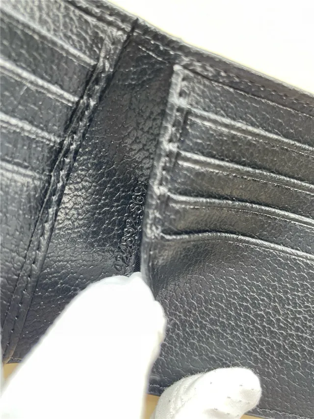 Gucci GG Marmont Portefeuille court monogramme embossé noir 2