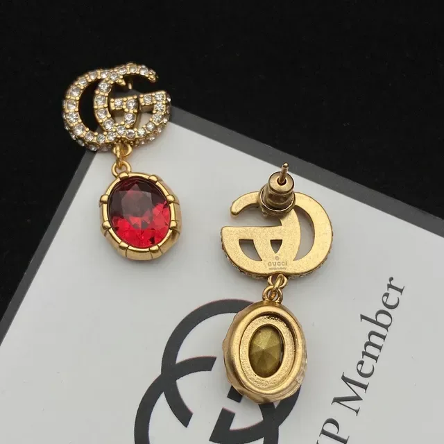 Boucles d'oreilles Gucci GG Marmont Double G à cristaux et pierres facetées 2