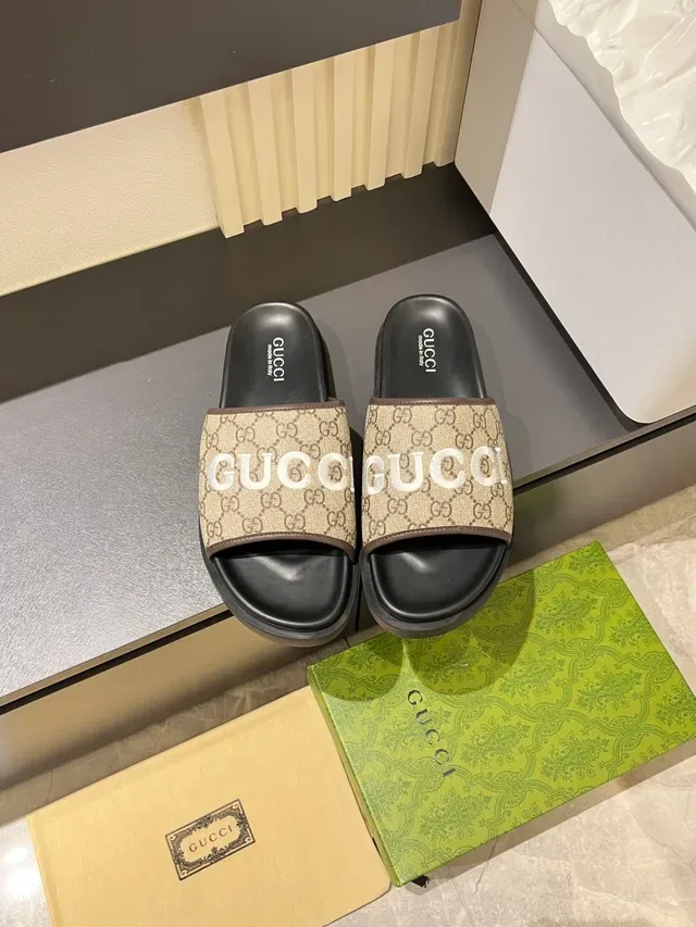 Gucci GG Slide Logo-Print Slippers 14