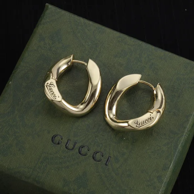 Gucci Gold Asymmetrical Curved Hoops Hinged Closure Earrings 2