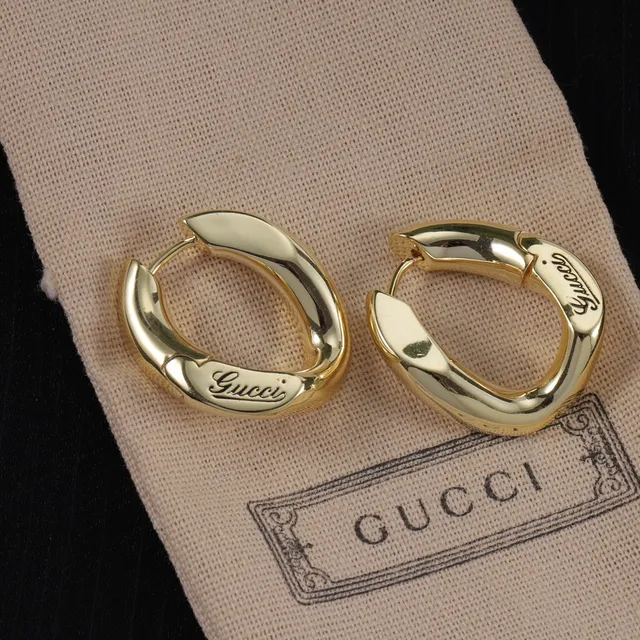 Gucci Gold Asymmetrical Curved Hoops Hinged Closure Earrings 5