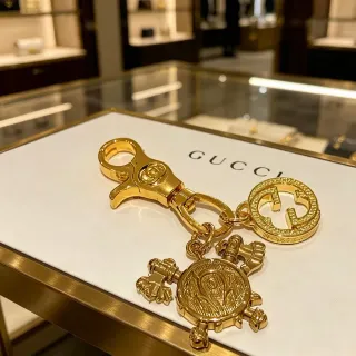Gucci Gold Metal Interlocking G Logo Jewelry
