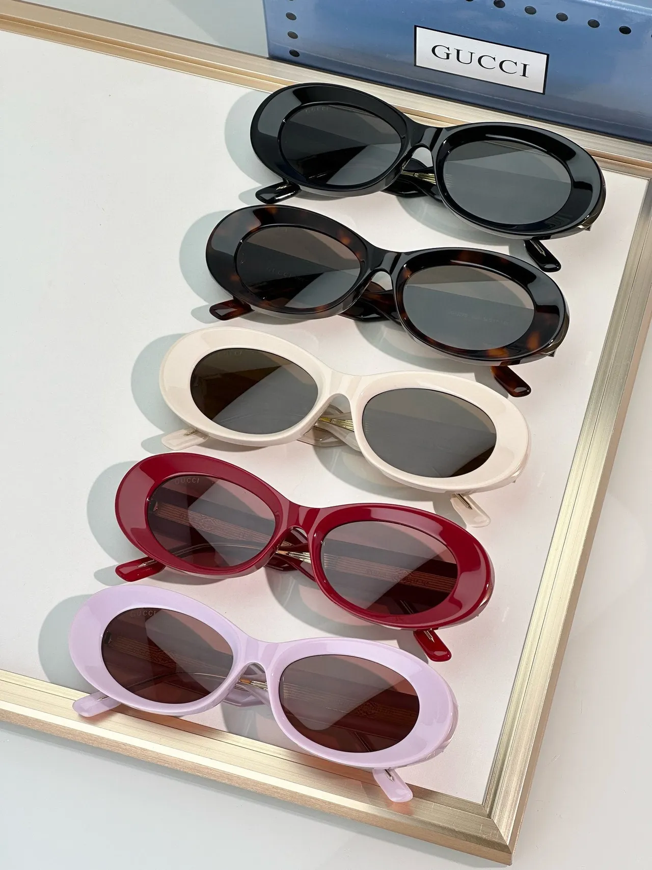 Gucci Lunettes de soleil Cadre ovale en acétate rose marron Acent du pont doré 4