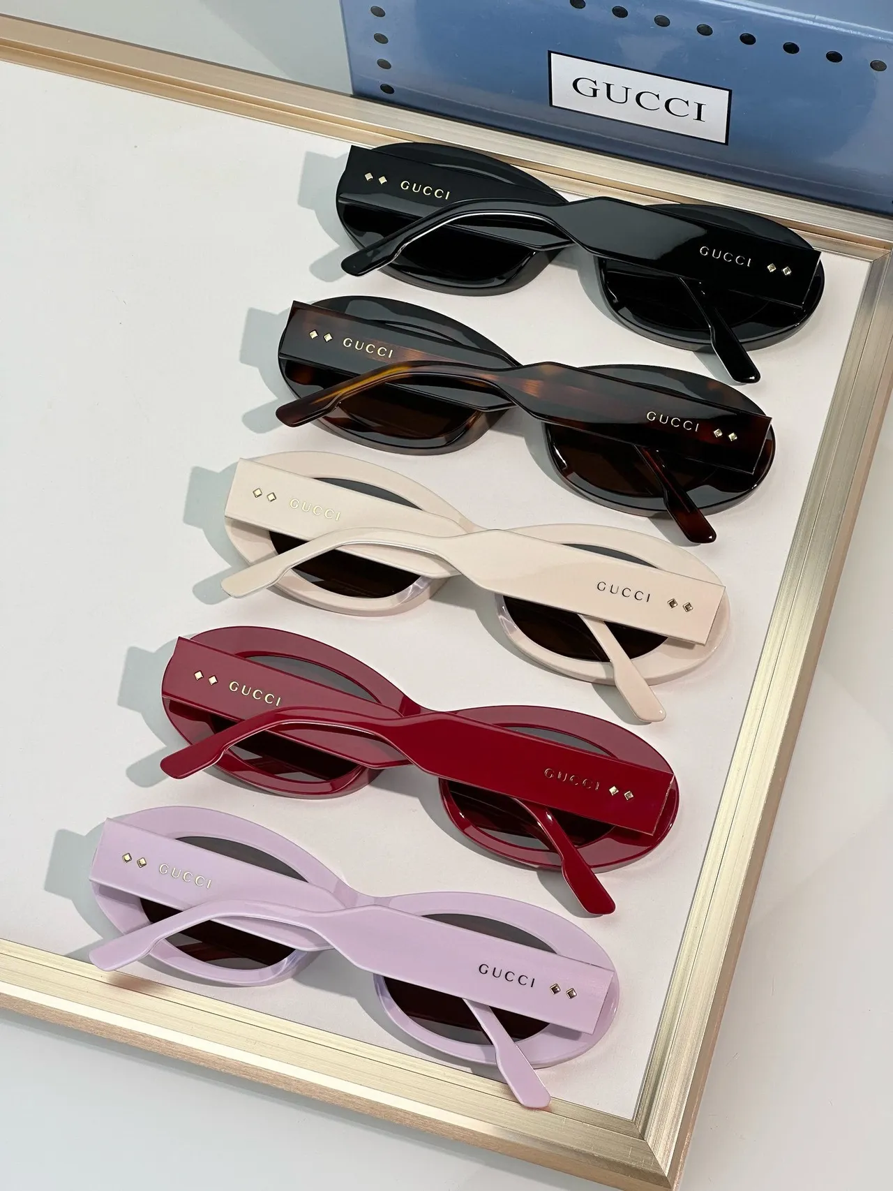 Gucci Lunettes de soleil Cadre ovale en acétate rose marron Acent du pont doré 5