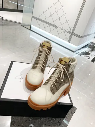 Gucci Rhyton GG Monogram بوت كعب كاحل مبطنة 7