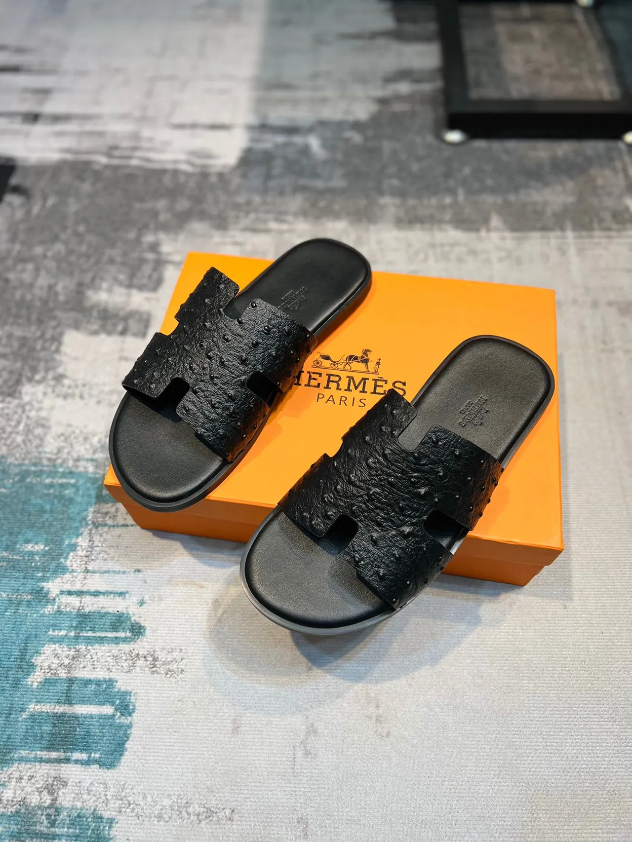 Hermès Black H-Shaped Strap Ostrich-Textured Leather Slippers 6
