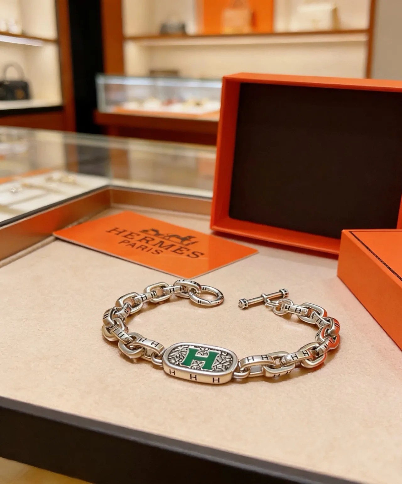 Hermès Chaîne d'Ancre Pulseira de elos de corrente prateado verde com esmalte medalhão H 4