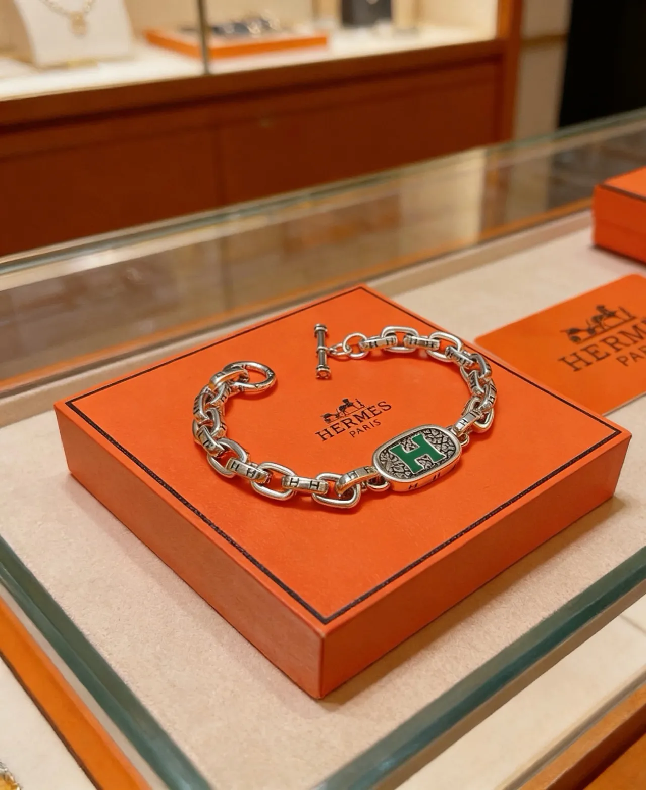 Hermès Chaîne d'Ancre Pulseira de elos de corrente prateado verde com esmalte medalhão H 7