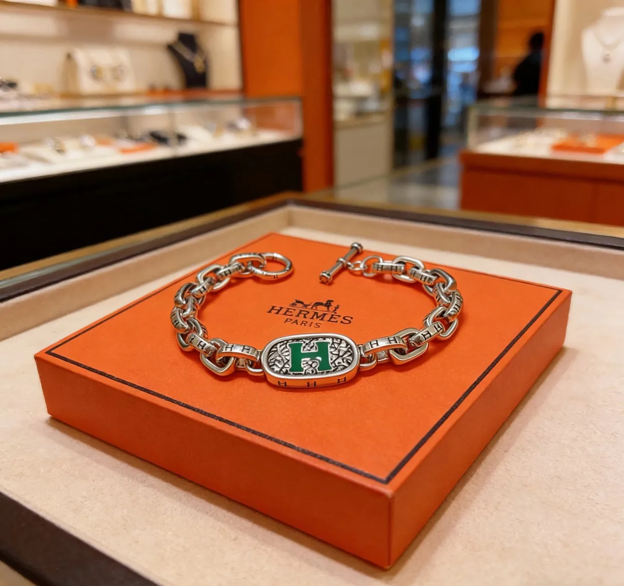 Hermès Chaîne d'Ancre Pulseira de elos de corrente prateado verde com esmalte medalhão H 10