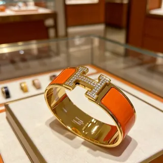 Pulsera Hermès Clic H Naranja Esmaltada Cristales Pavé Oro