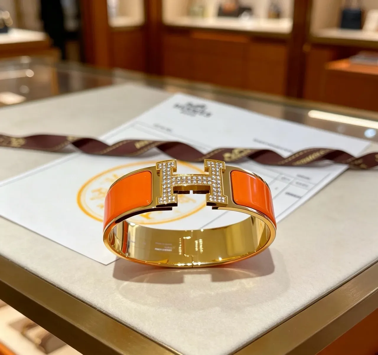 Bracelet Hermès Clic H Orange Émaillé Cristaux Pavés Or 9