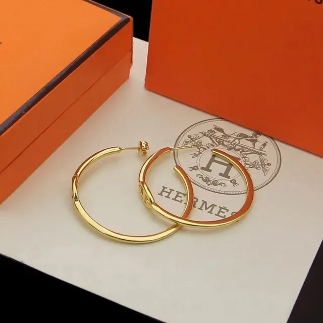أقراط حلقية Hermès ذهبية ومينا أحمر 7