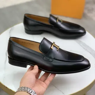 Hermès Oran Loafer Cuero negro pulido hebilla dorada H Mocasines
