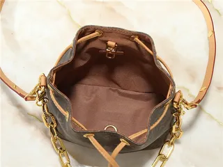 Louis Vuitton حقيبة دلو جلد بيج ذهبي مطبوع بمونوجرام حزام سلسلة 2