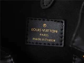 Louis Vuitton حقيبة دلو جلد بيج ذهبي مطبوع بمونوجرام حزام سلسلة 12
