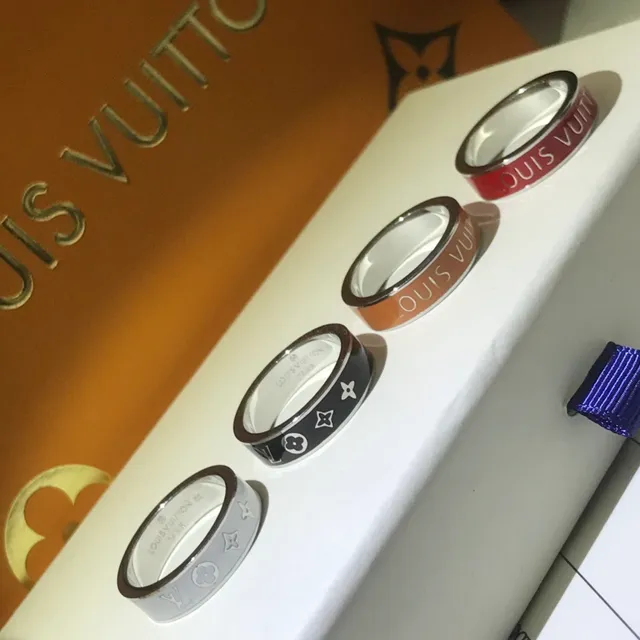 Louis Vuitton Gold Black Enamel-Band Engraved Logo Ring 9