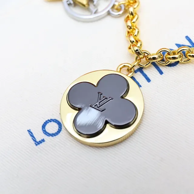 Louis Vuitton Gold Black Metal Multi-Charm Bracelet 2