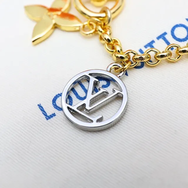 Louis Vuitton Gold Black Metal Multi-Charm Bracelet 4