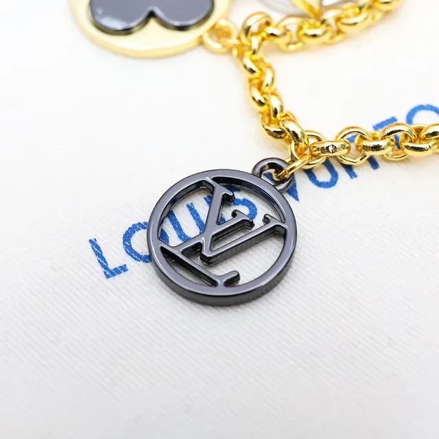 Louis Vuitton Gold Black Metal Multi-Charm Bracelet 8