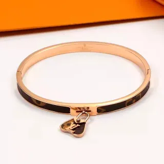 Louis Vuitton Pulsera Hinged Dorado Marrón Monograma Cuero Inlay