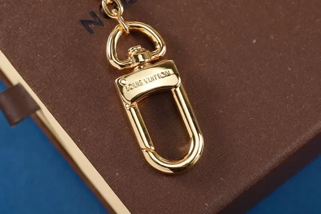 Louis Vuitton Gold Metal Multi-Charm Bracelet 5