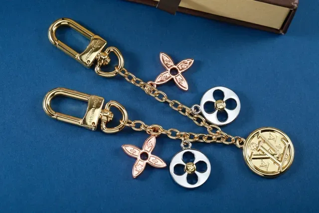 Louis Vuitton Gold Metal Multi-Charm Bracelet 7