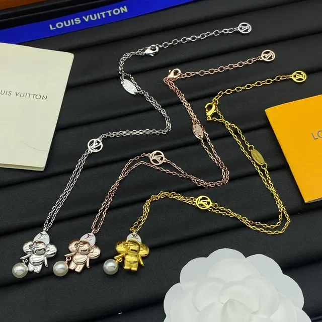 Louis Vuitton Gold Silver Chain-Link Character Pendant Necklace 2