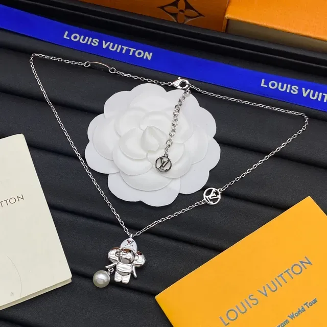 Louis Vuitton Gold Silver Chain-Link Character Pendant Necklace 4