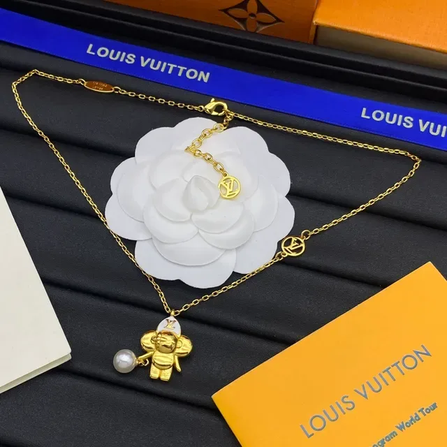 Louis Vuitton Gold Silver Chain-Link Character Pendant Necklace 5
