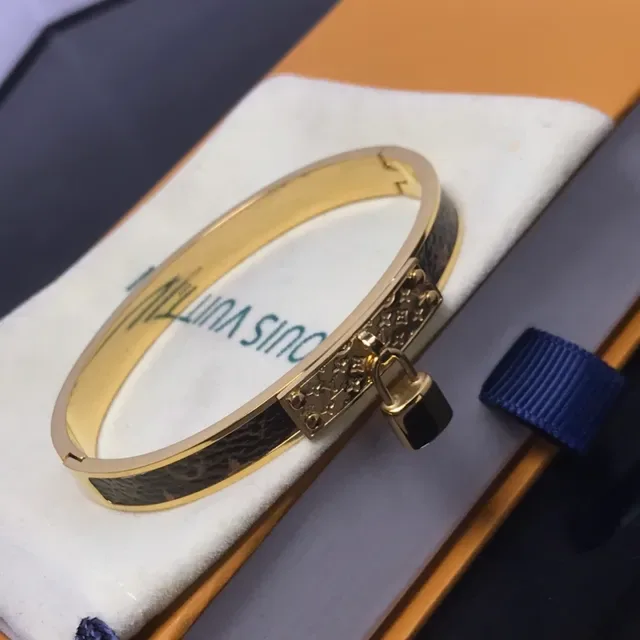 Louis Vuitton Lockit Monogram Canvas Gold-Tone Padlock Bracelet 3