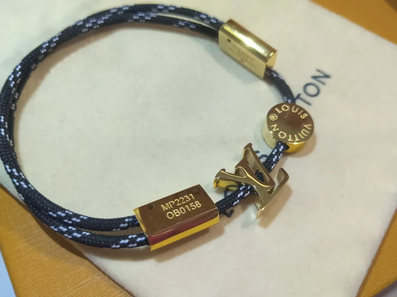 Louis Vuitton LV Circle Bracelet Black and White Braided Cord Rose Gold-Tone Metal Bracelet 3